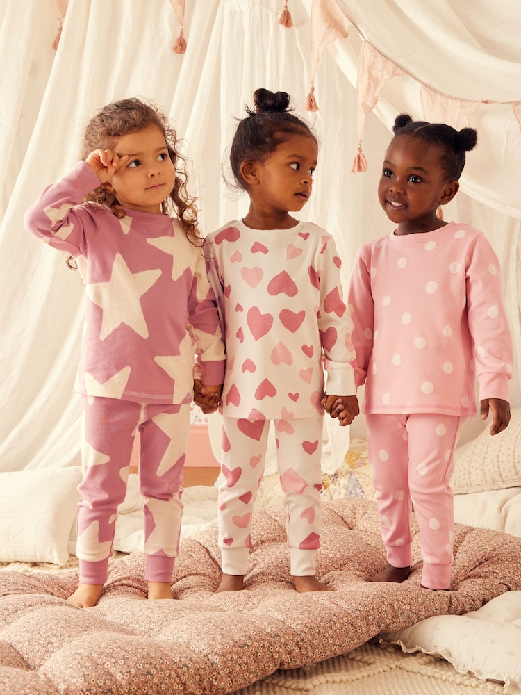 Pink/White 3 Pack 100% Cotton Snuggle Pyjamas (9mths-12yrs) - Image 1 of 12 Pink/White 3 Pack 100% Cotton Snuggle Pyjamas (9mths-12yrs) - Image 1 of 12