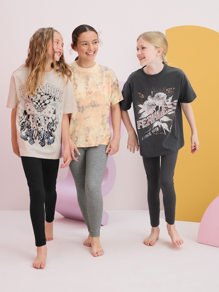 Black/Ecru 3 Pack 100% Cotton Legging Pyjamas (3-16yrs) - Image 1 of 11 Black/Ecru 3 Pack 100% Cotton Legging Pyjamas (3-16yrs) - Image 1 of 11