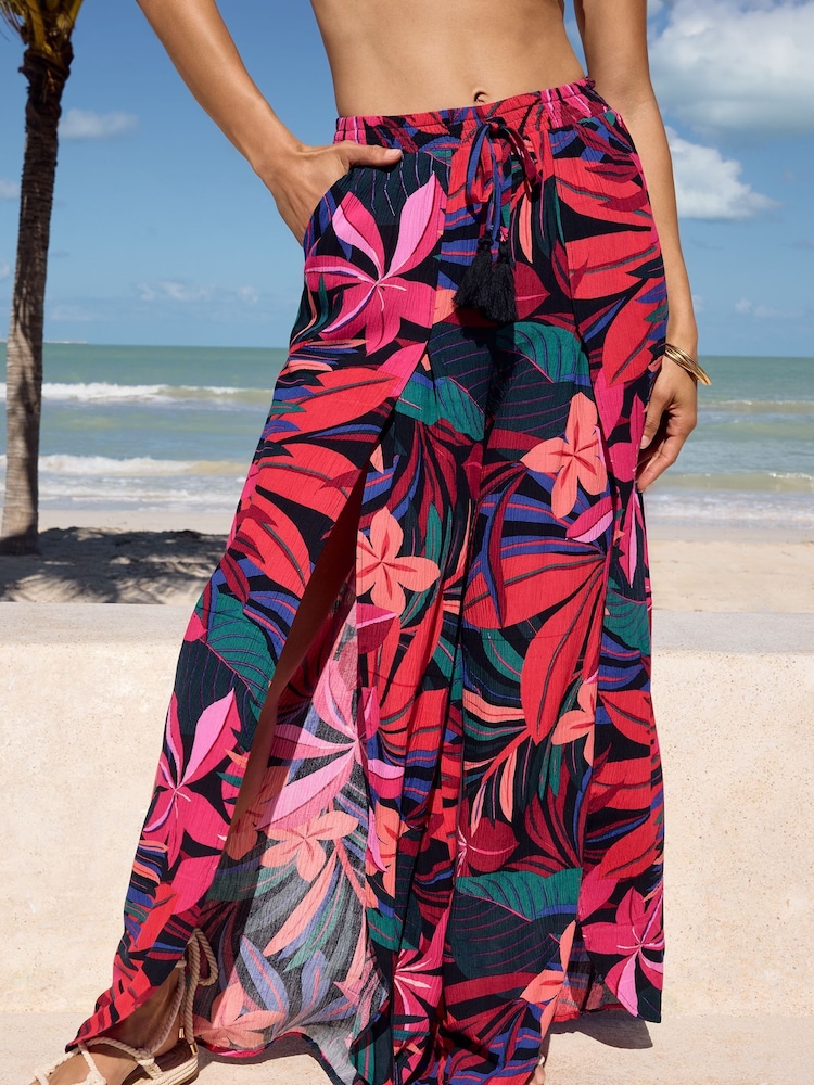 Love & Roses Pink Print Petite Split Detail Beach Tie Front Trousers - Image 1 of 4