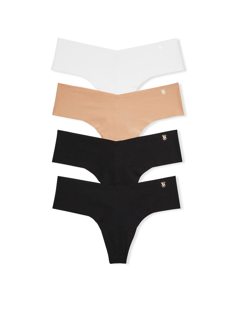 Victoria's Secret BlackWhiteNude Thong 4 Pack Knickers - Image 1 of 3 Victoria's Secret BlackWhiteNude Thong 4 Pack Knickers - Image 1 of 3