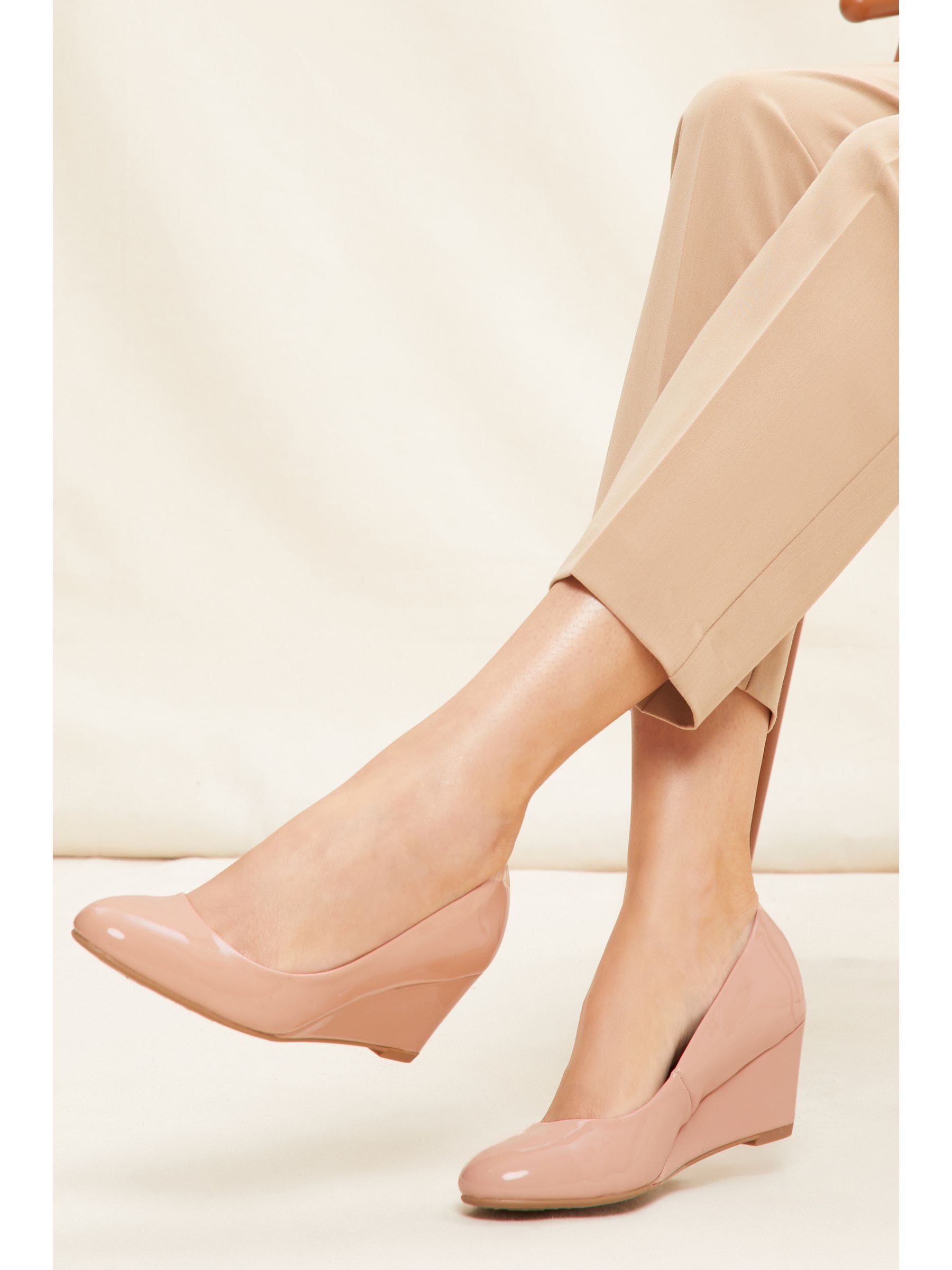 Buy Friends Like These Nude Patent Patent Wedge Court Shoes from Next Ireland