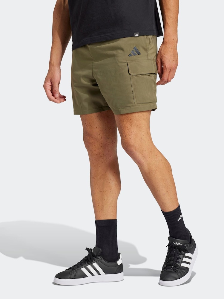 adidas Olive Green Essentials Small Logo Cargo Chelsea Shorts - Image 1 of 6 adidas Olive Green Essentials Small Logo Cargo Chelsea Shorts - Image 1 of 6