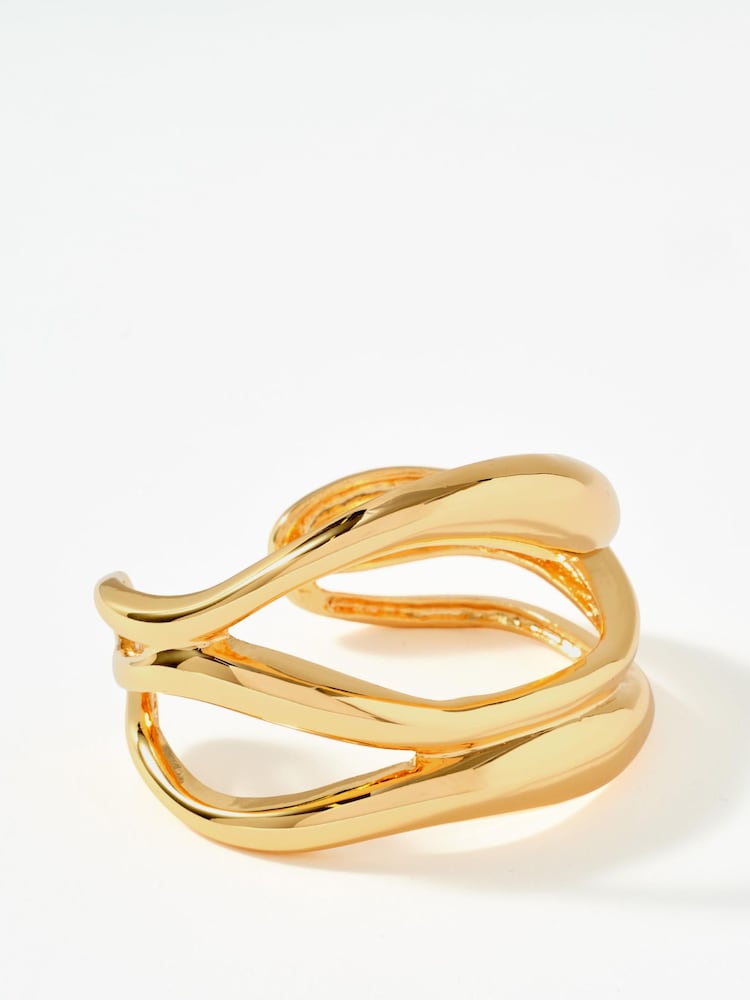 Guldfarvet tone. - Mint Velvet Sculpted Open Wave Bangle - Billede 1 af 3 Guldfarvet tone. - Mint Velvet Sculpted Open Wave Bangle - Billede 1 af 3