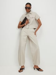 River Island-bukser i bomullsblanding med Baggy bukseben - Bilde 1 av 4