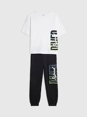 طقم من تيشرت وبنطلون رياضي بشعار "River" من River Island - صورة 3 من 4