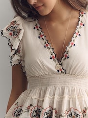 Anthropologie Cream Embroidered Flutter-Sleeve Top - Image 1 of 3