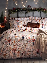 furn. Multicolour Nutcracker Christmas Reversible Duvet Cover and Pillowcase Set - Image 1 of 3