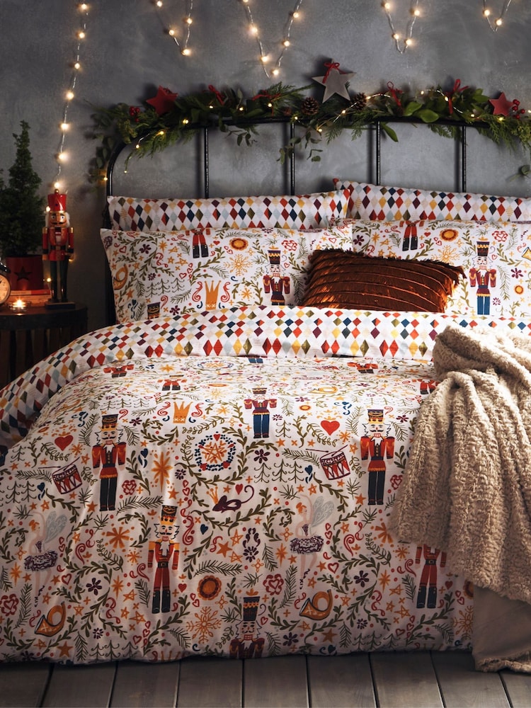 furn. Multicolour Nutcracker Christmas Reversible Duvet Cover and Pillowcase Set - Image 1 of 3