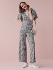 Lilac Purple Ditsy Floral Flute Sleeve V-Neck Jumpsuit - Image 1 of 3
