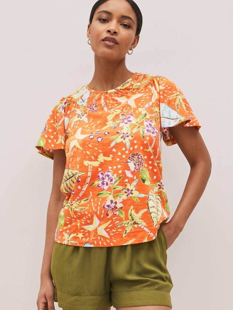 Orange Tropical Smocked Short Sleeves Round Neck Top - Image 1 of 5