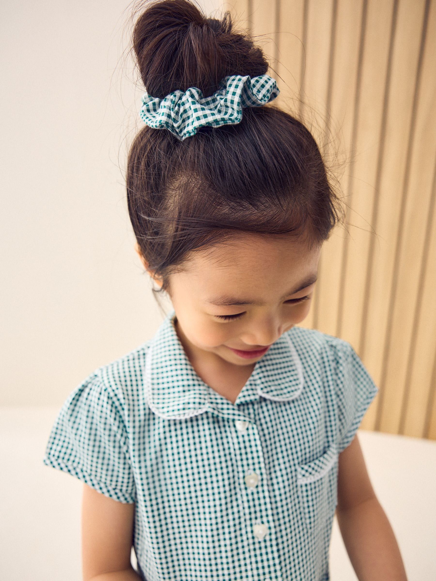 Green and white gingham school dress store