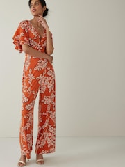 Orange Leaf Print Flute Sleeve V-Neck Jumpsuit - Image 1 of 5