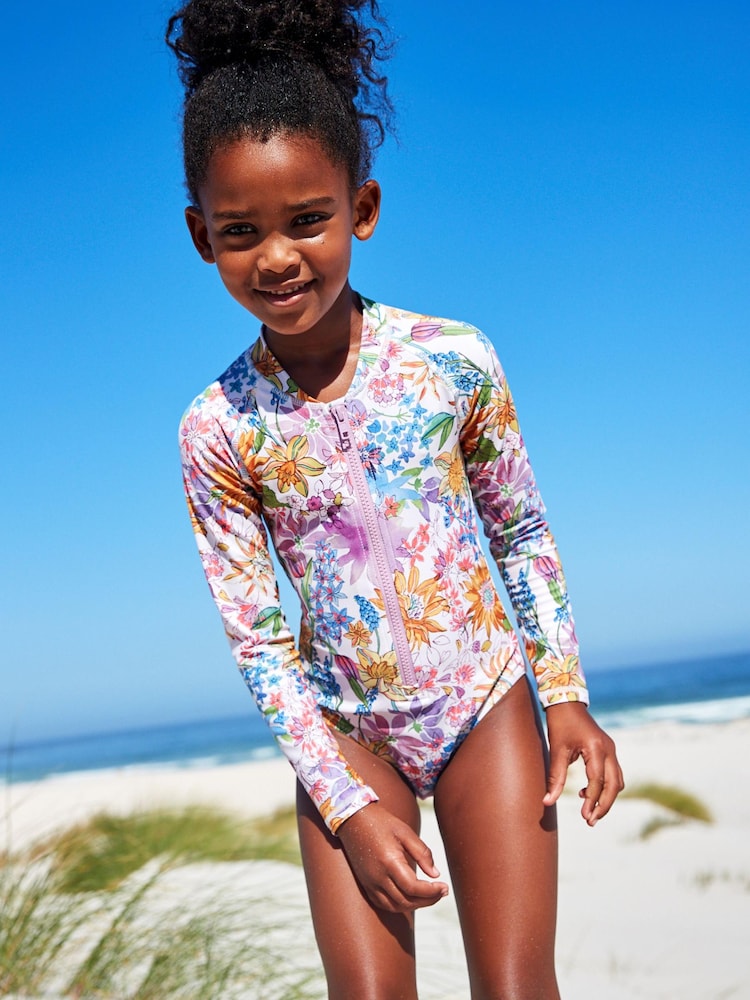Purple Floral Long Sleeved Swimsuit (3-16yrs) - Image 1 of 6 Purple Floral Long Sleeved Swimsuit (3-16yrs) - Image 1 of 6