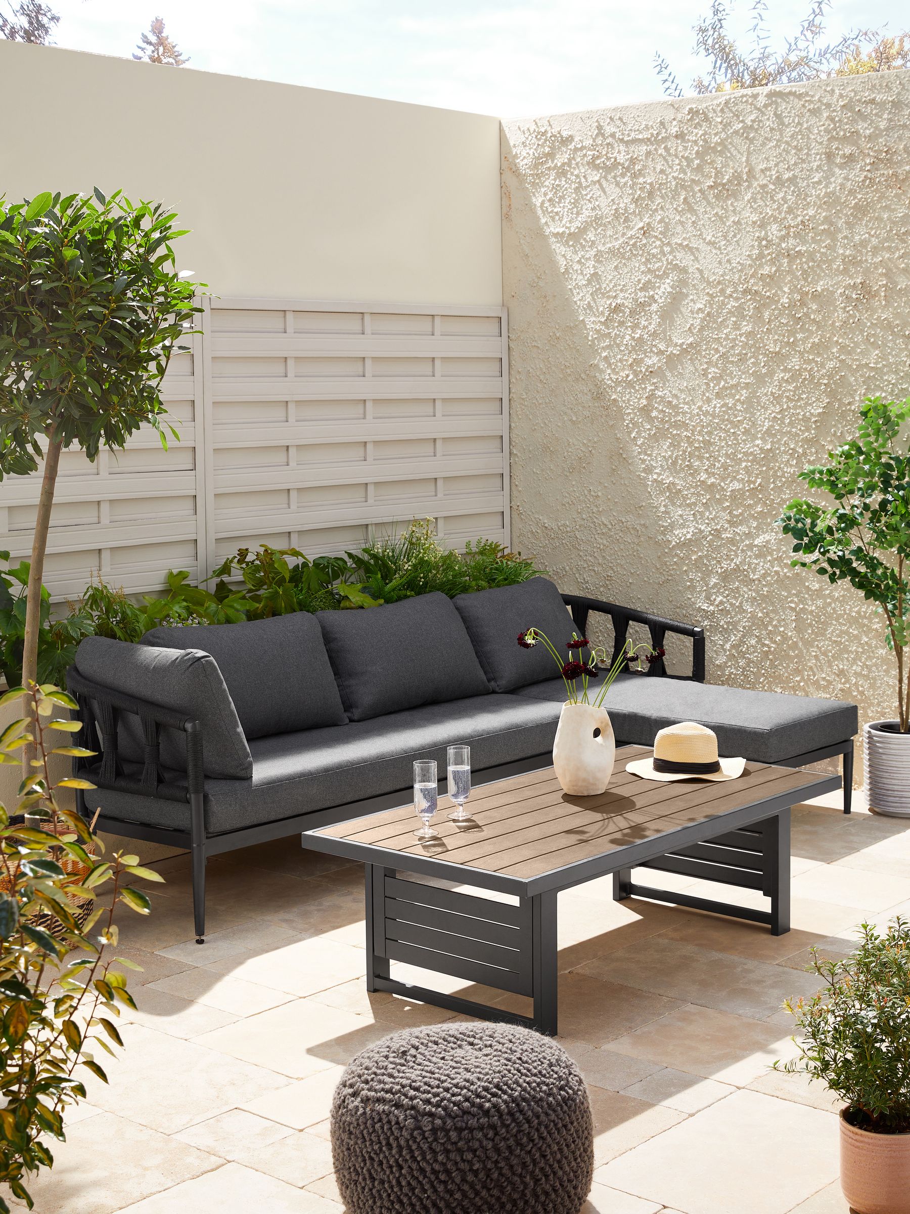 Buy Black Sorrento Garden Sofa Chaise and Rising Table Dining Set from the Next UK online shop