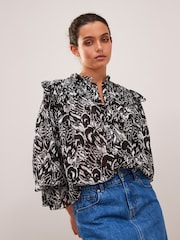 Black and White Feather Print Ruffle Shirred Long Sleeve Blouse - Image 1 of 5