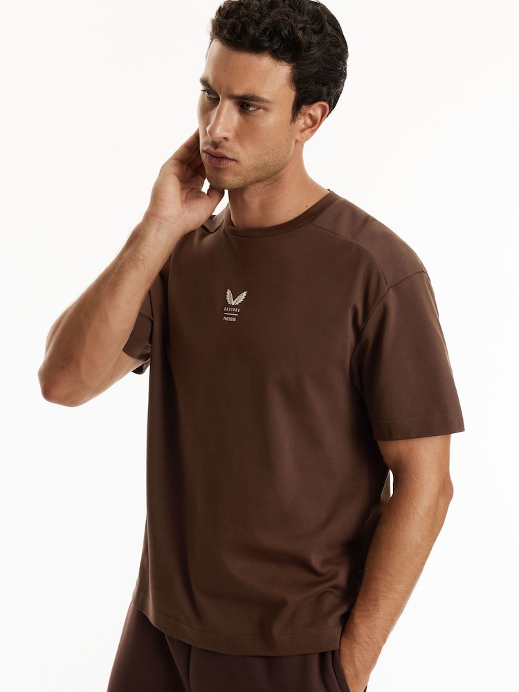 Reiss Cocoa Bark/Stone Cas Reiss | Castore Cotton Relaxed Graphic T-shirt - Image 1 of 6 Reiss Cocoa Bark/Stone Cas Reiss | Castore Cotton Relaxed Graphic T-shirt - Image 1 of 6