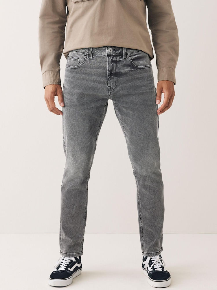Grey Skinny Fit Next Motion Flex Stretch Jeans - Image 1 of 9