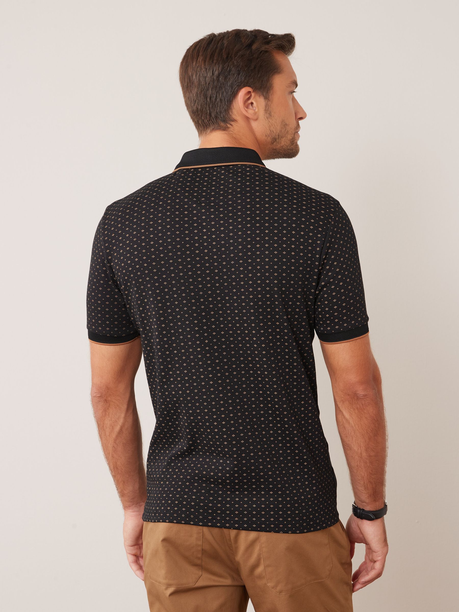 Buy Black/Gold Diamond Short Sleeve Print Polo Shirt from Buy Black/Gold Diamond Short Sleeve Print Polo Shirt from