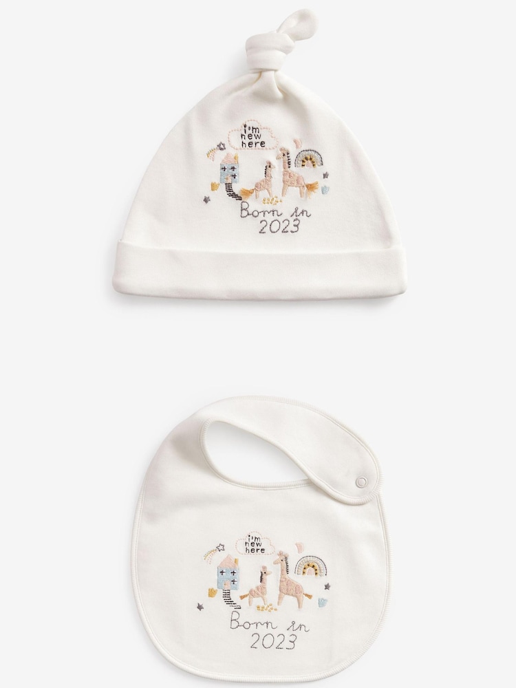 White Born In 2023 Baby Hat And Bib Set (0-12mths) - Image 1 of 2 White Born In 2023 Baby Hat And Bib Set (0-12mths) - Image 1 of 2