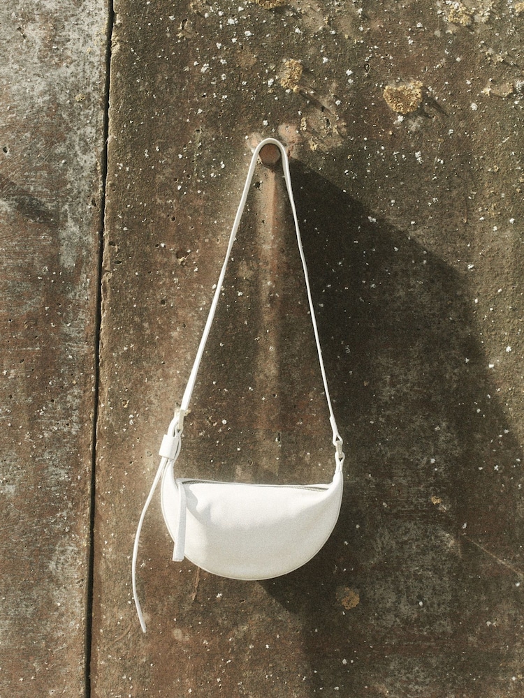 AllSaints White Half Moon Cross-Body Bag - Image 1 of 7