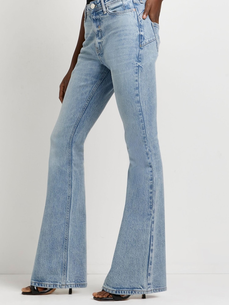 River Island Blue Mid Rise Bum Sculpt Flare Jean - Image 1 of 4 River Island Blue Mid Rise Bum Sculpt Flare Jean - Image 1 of 4