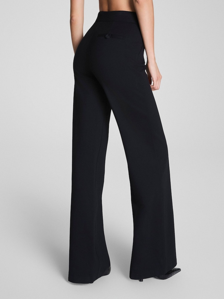 spanx black dress pants Spanx Perfect Pant Review: Why Our Style Editors Love Them