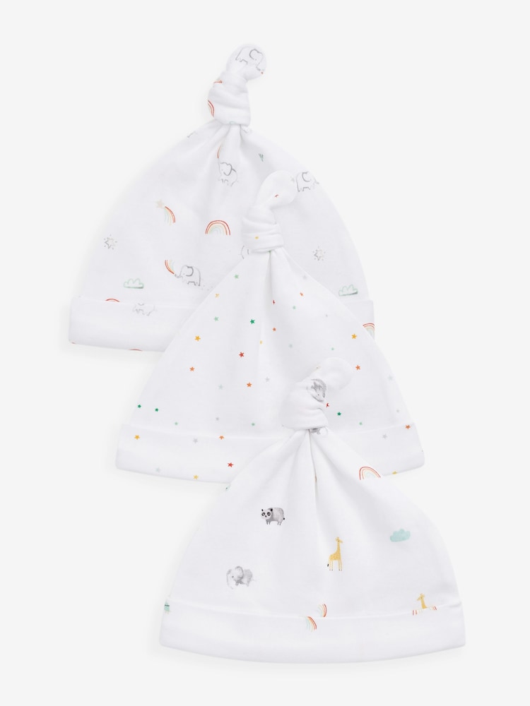 Leuchtender Regenbogen-Druck, Weiß - Babymützen aus Baumwolle mit Krawattenverschluss, 100 % Baumwolle, 3er-Pack (0–12 Monate) - Bild 1 von 6 Leuchtender Regenbogen-Druck, Weiß - Babymützen aus Baumwolle mit Krawattenverschluss, 100 % Baumwolle, 3er-Pack (0–12 Monate) - Bild 1 von 6