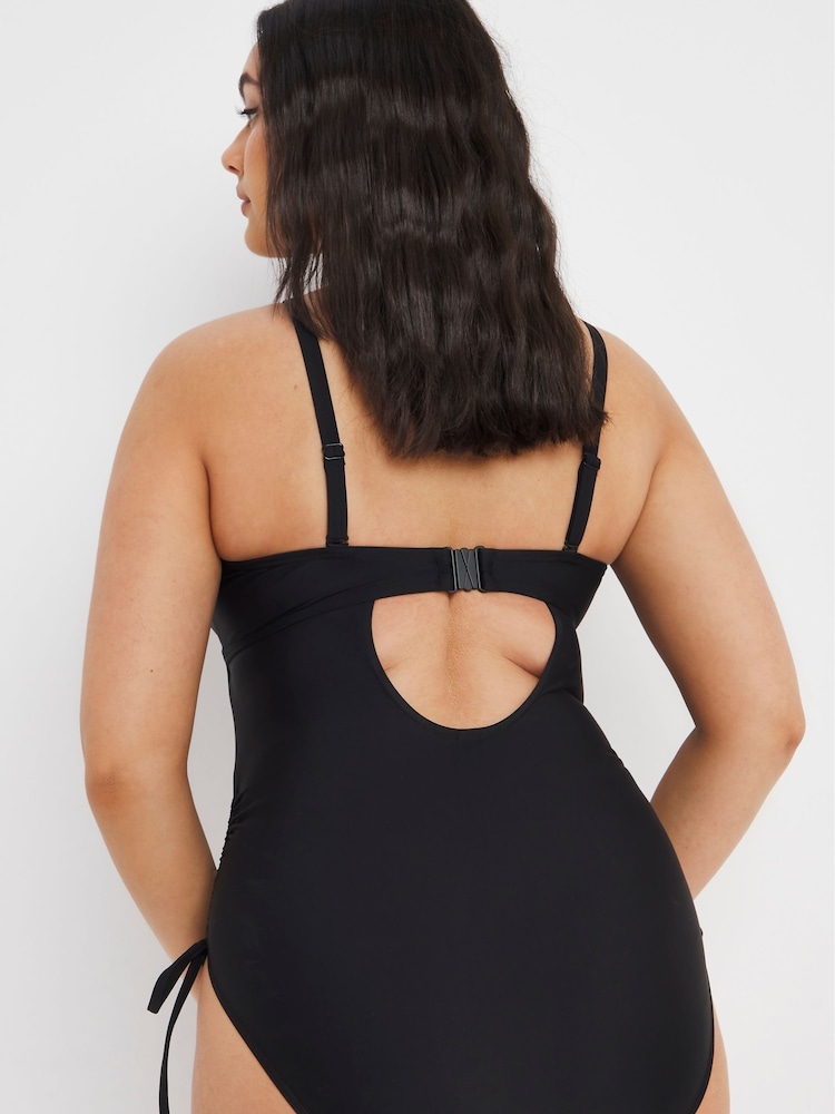 Figleaves Rene Black Underwired Tummy Control Adjustable Leg Bandeau Swimsuit - Image 2 of 4