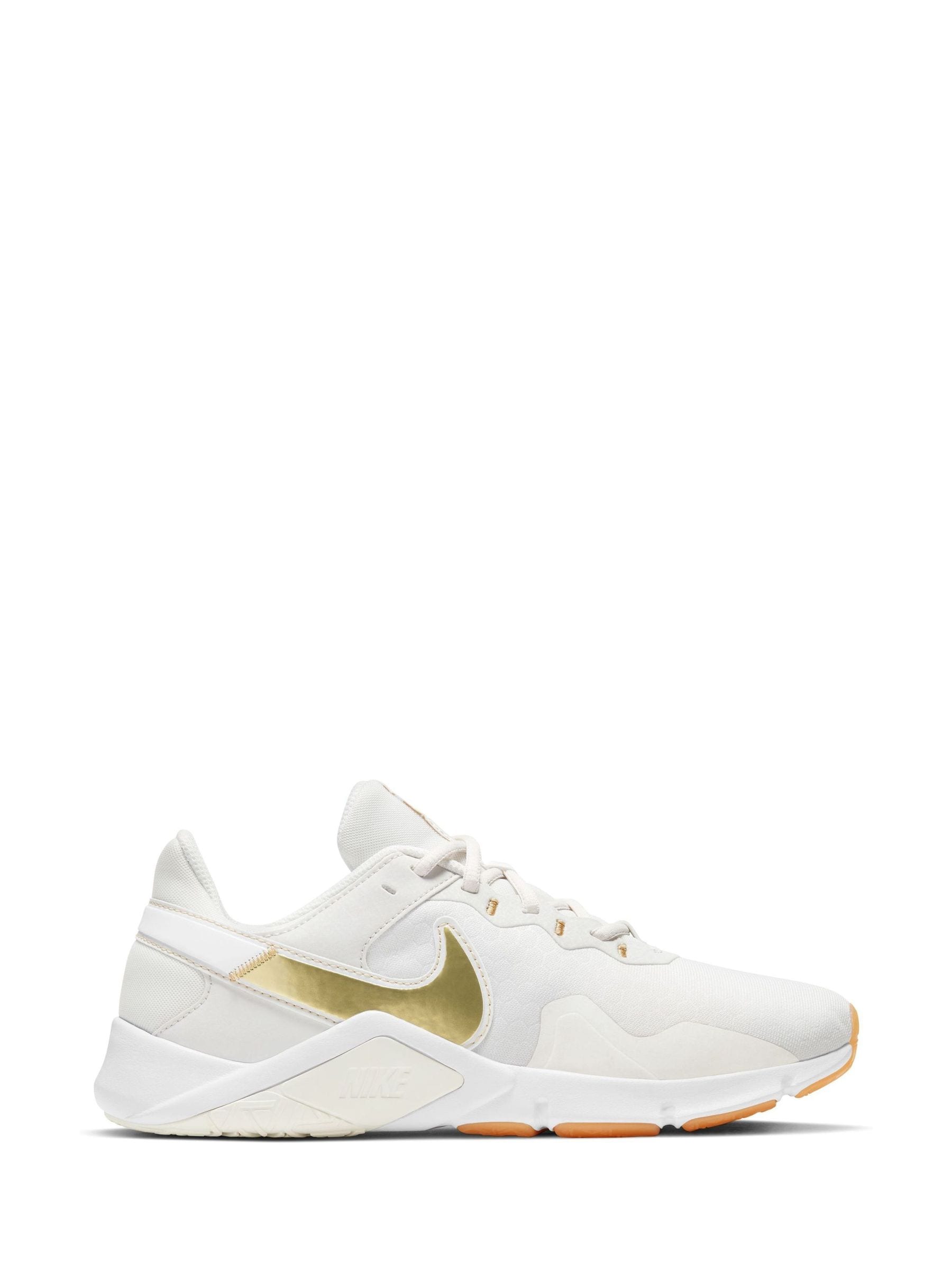 Buy Nike White Gold Legend Essential 2 Trainers from Next Austria
