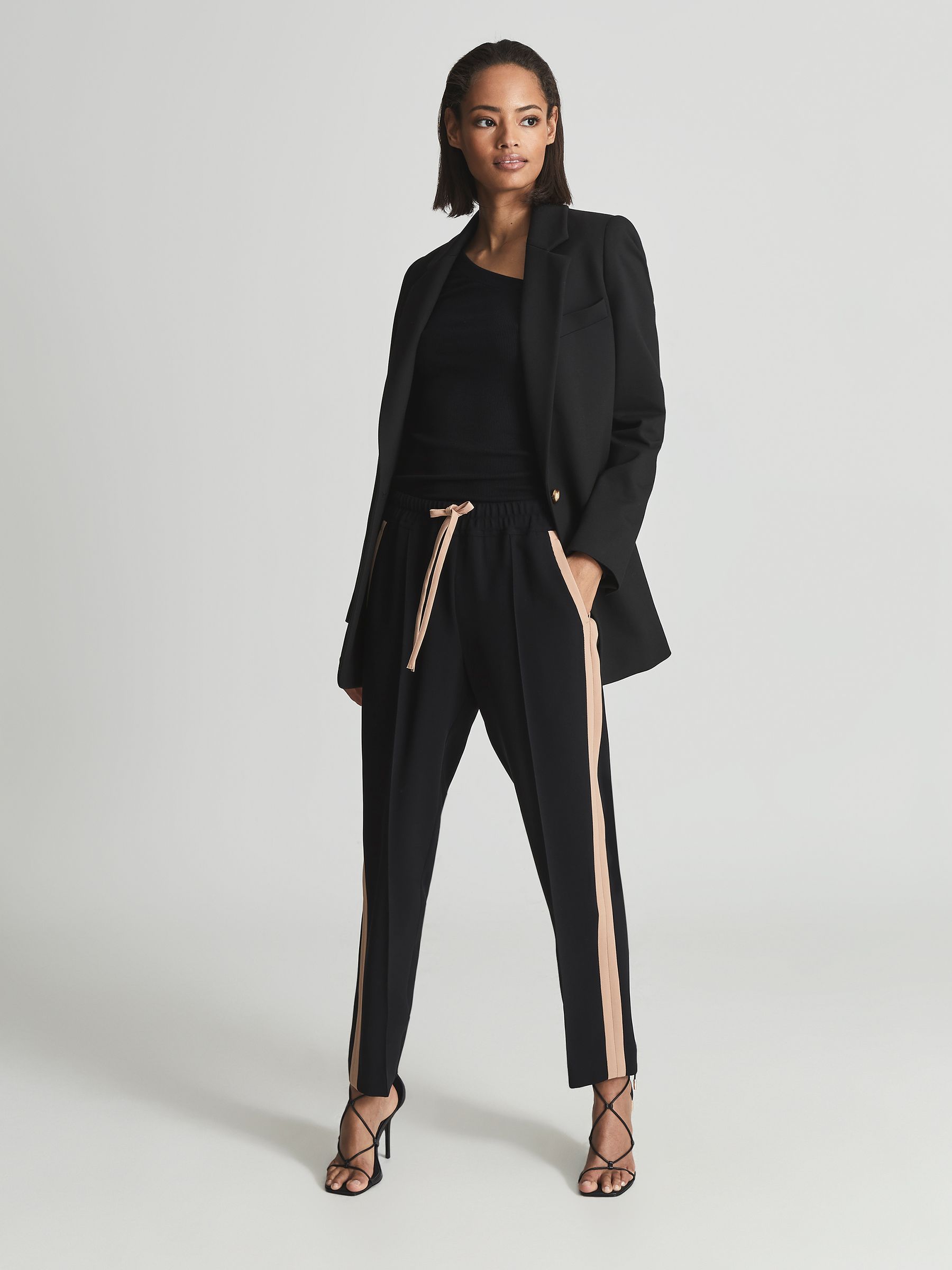 Tapered trousers with side stripe sales