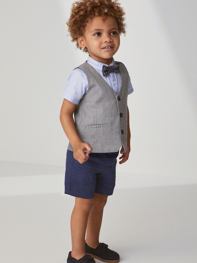 Blue 4pc Waistcoat, Shirt, Shorts & Bow Tie Set (3mths-9yrs) - Image 1 of 6 Blue 4pc Waistcoat, Shirt, Shorts & Bow Tie Set (3mths-9yrs) - Image 1 of 6