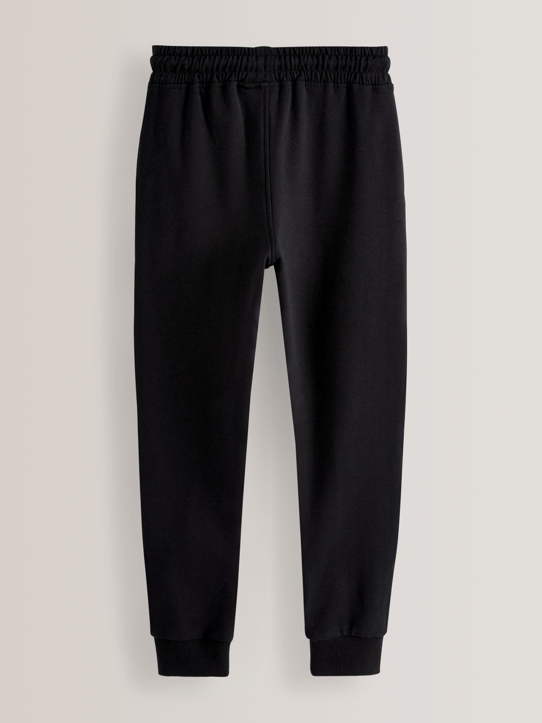 Buy Dark Black Longer Length Skinny Fit Joggers 3 16yrs from the Next UK online shop