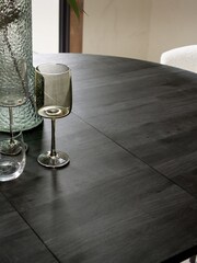 Black Bronx Oak Effect Round 4 to 6 Seater Extending Dining Table - Image 3 of 7