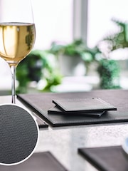 Set of 4 Black Reversible Faux Leather Placemats and Coasters Set - Image 1 of 4