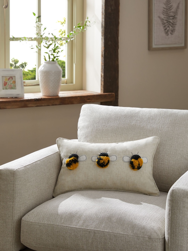 Ochre Yellow 50 x 30cm Tufted Pom Bee Trio Cushion - Image 1 of 4
