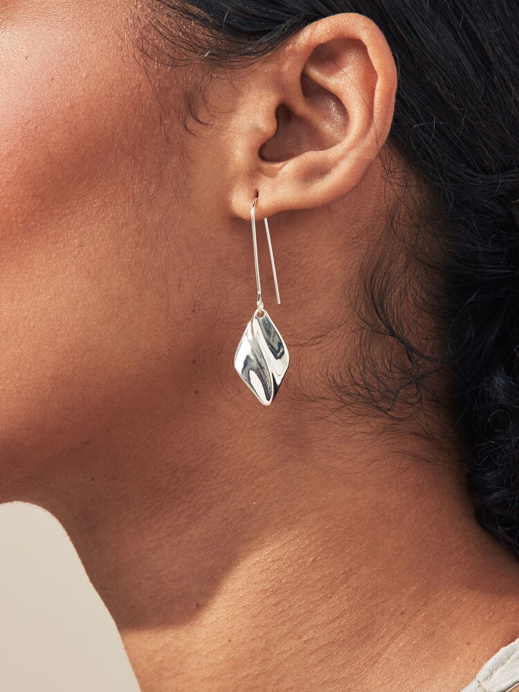 Silver Tone Wave Pull Through Earrings Made with Recycled Metal - Image 2 of 3 Silver Tone Wave Pull Through Earrings Made with Recycled Metal - Image 2 of 3