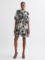 Florere Polka Dot Puff Sleeve Mini Dress - Image 1 of 5