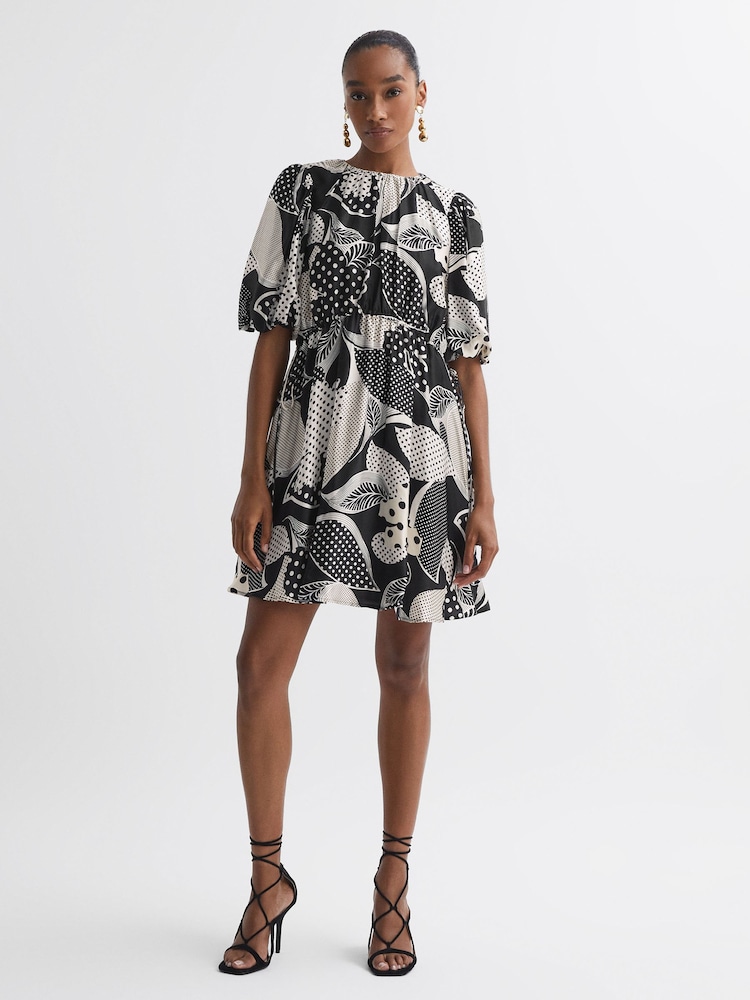 Florere gepunktetes Minikleid mit Puffärmeln - Bild 1 von 5 Florere gepunktetes Minikleid mit Puffärmeln - Bild 1 von 5