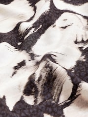 Monochrom geblümt - Schulterfreier Jumpsuit - Bild 6 von 6