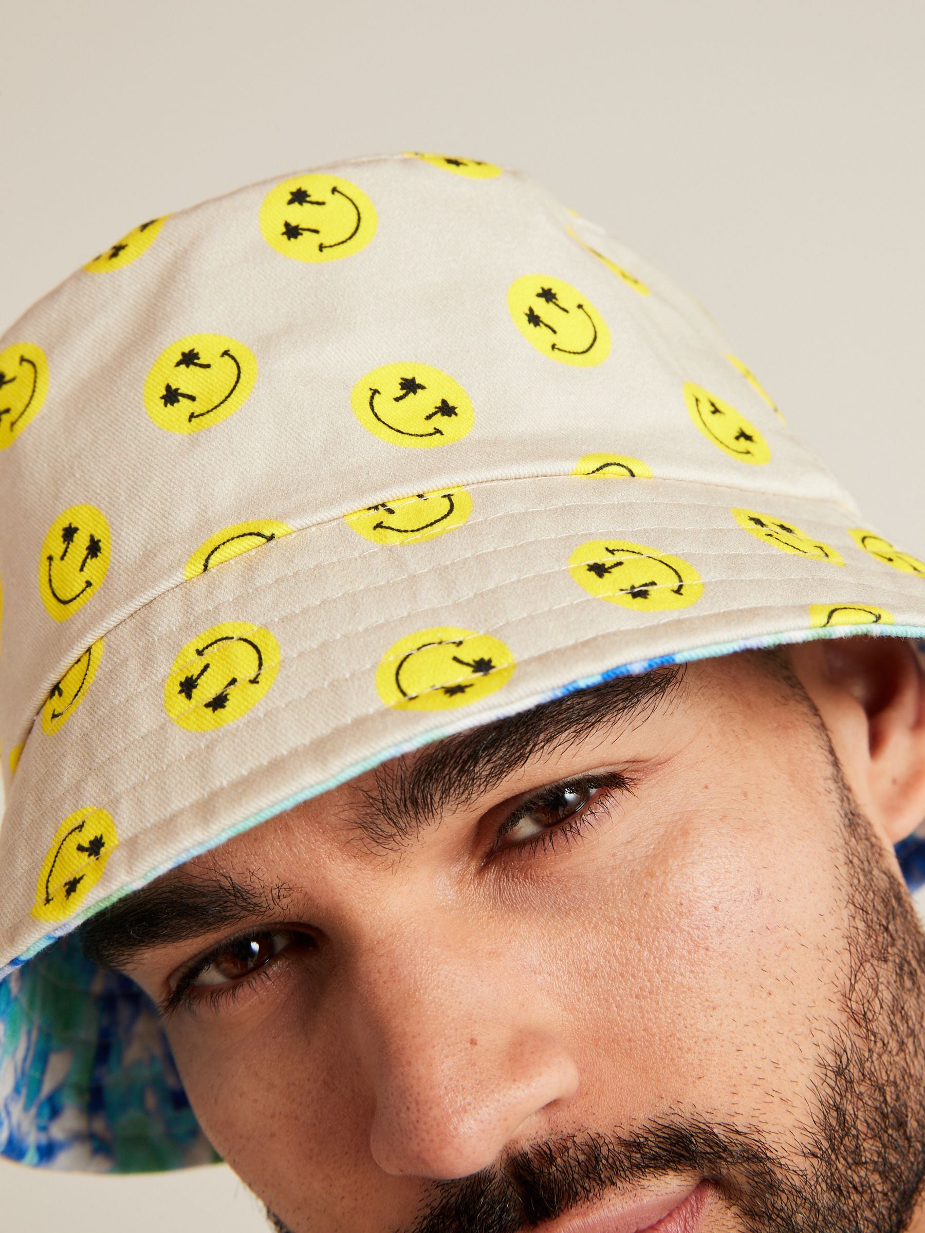 Buy Blue Tie Dye Smile Face Festival Reversible Bucket Hat from Next Luxembourg