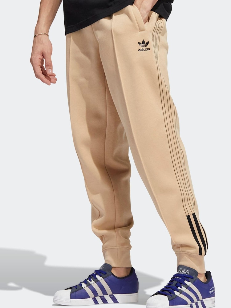 adidas Originals Yellow Fleece SST Joggers - Image 1 of 5