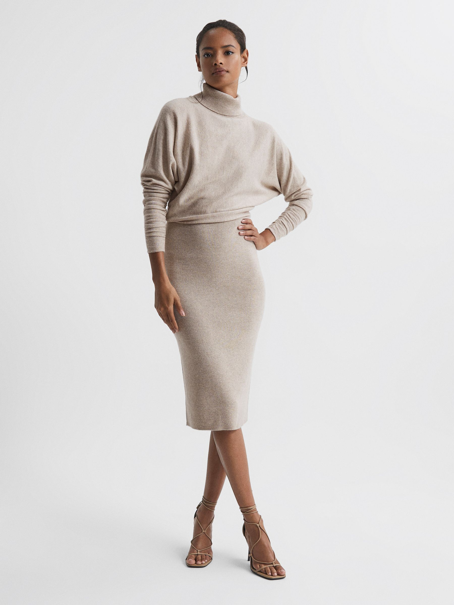 Skirt and polo neck outfit on sale