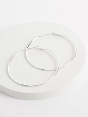 Silver Tone Oversized Hoop Earrings - Image 1 of 2
