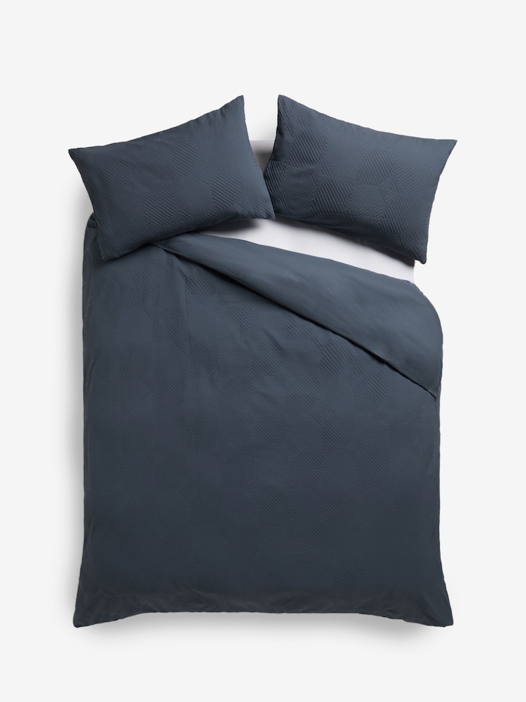 Navy Blue Embossed Geometric Duvet Cover And Pillowcase Set - Image 1 of 3