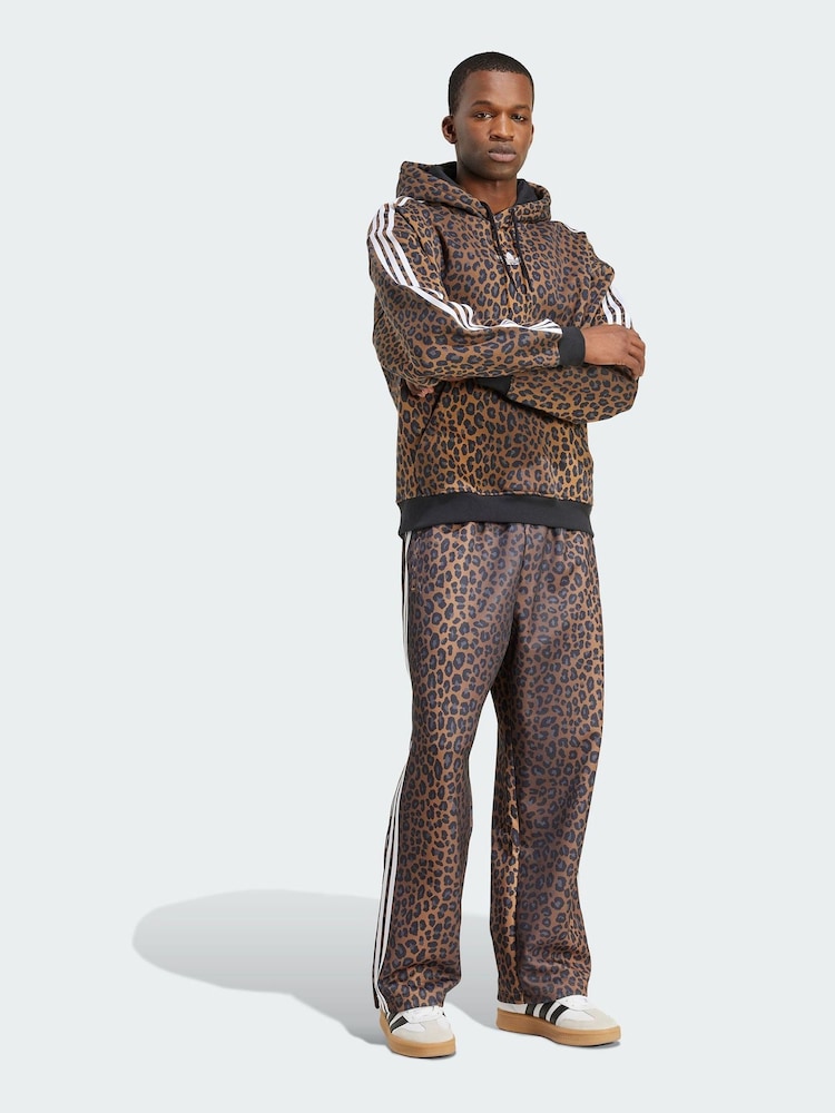 adidas Originals Brown Firebird Loose Leopard Track Joggers - Image 1 of 5 adidas Originals Brown Firebird Loose Leopard Track Joggers - Image 1 of 5
