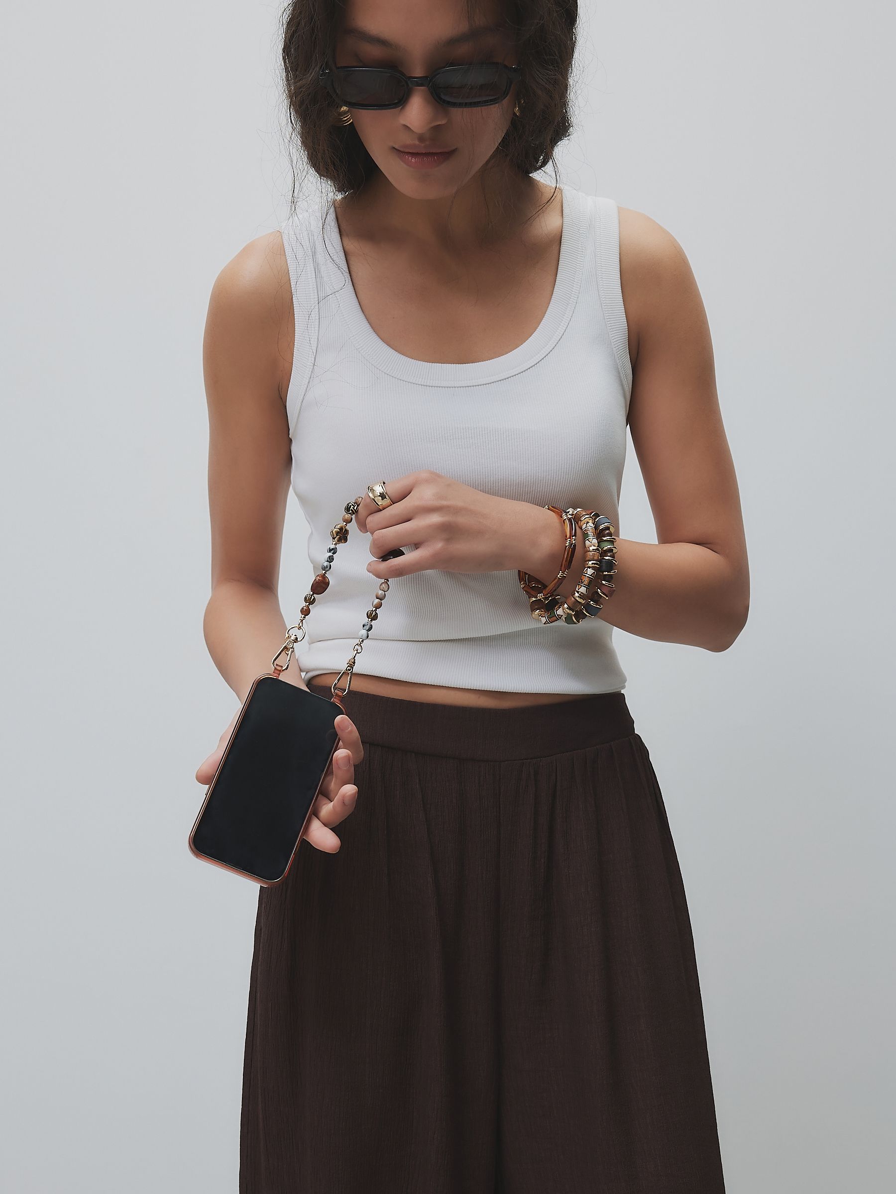 Buy Chocolate Brown Resin Bead Phone Strap Wristlet from the Next
