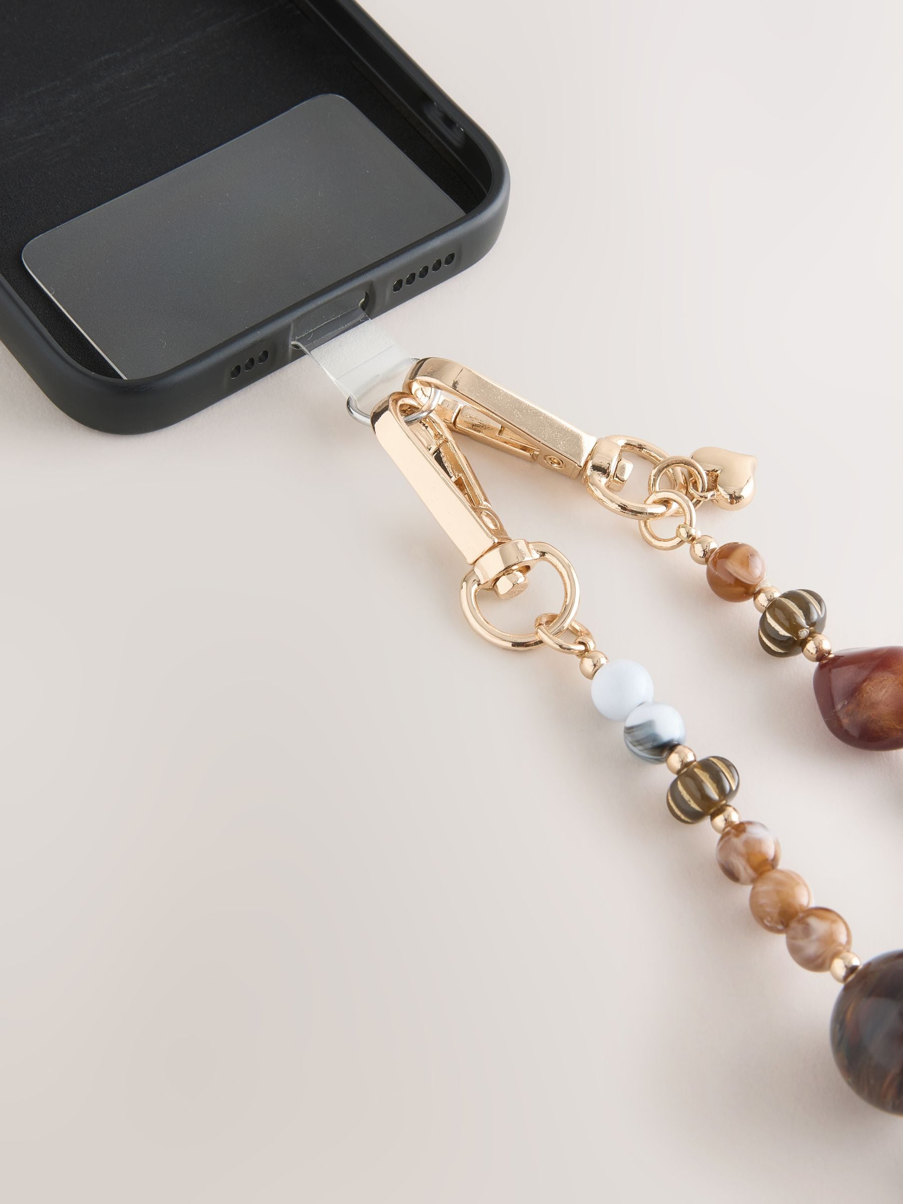 Buy Chocolate Brown Resin Bead Phone Strap Wristlet from the Next