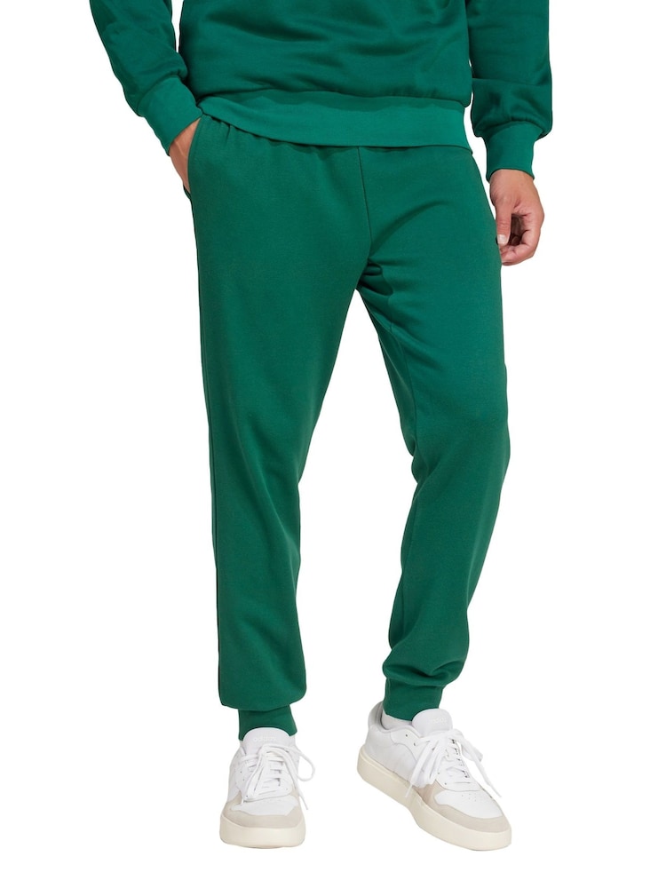 adidas Green Essentials Feel Cosy French Terry Joggers - Image 1 of 5 adidas Green Essentials Feel Cosy French Terry Joggers - Image 1 of 5