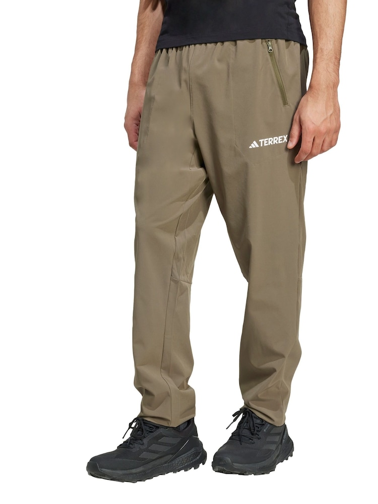 adidas Terrex Green Multi Essentials Stretch Joggers - Image 1 of 5 adidas Terrex Green Multi Essentials Stretch Joggers - Image 1 of 5