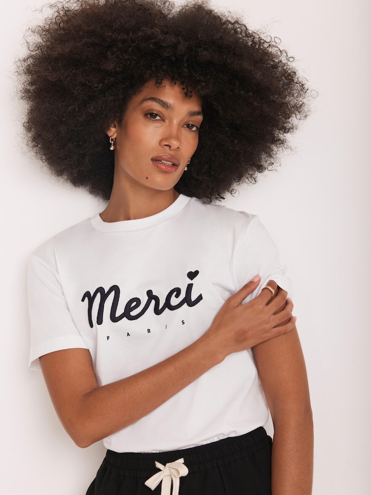 Mint Velvet White Merci Graphic Print T-Shirt - Image 1 of 9 Mint Velvet White Merci Graphic Print T-Shirt - Image 1 of 9